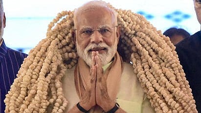 <div class="paragraphs"><p>Prime Minister Narendra Modi with Bihar Chief Minister Nitish Kumar being garlanded during the inauguration and foundation stone laying ceremony of various development projects, in Purnea, Bihar</p></div>