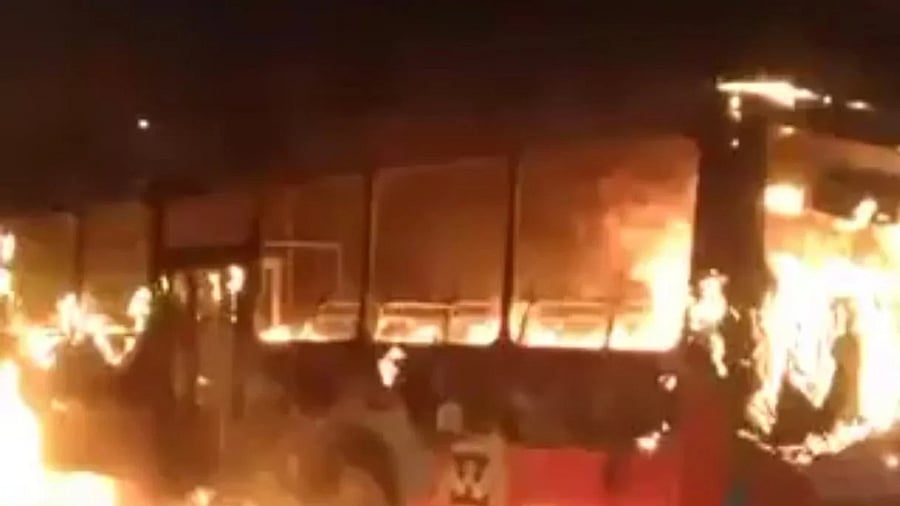 A screengrab shows the BMTC bus on fire.