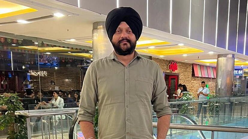 <div class="paragraphs"><p>A photo from the family album of Navjot Singh, Deputy Secretary in the Department of Economic Affairs, Ministry of Finance, who was killed after a BMW allegedly hit his motorcycle near Delhi Cantonment metro station on Ring Road, in New Delhi.</p></div>