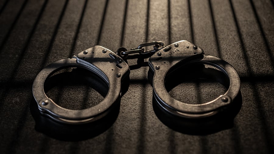 <div class="paragraphs"><p>Image of handcuffs representing arrest.</p></div>