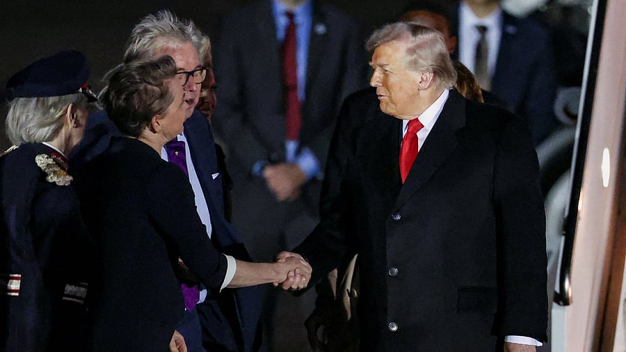 <div class="paragraphs"><p>US President Donald Trump shakes hands with British Foreign Secretary Yvette Cooper </p></div>