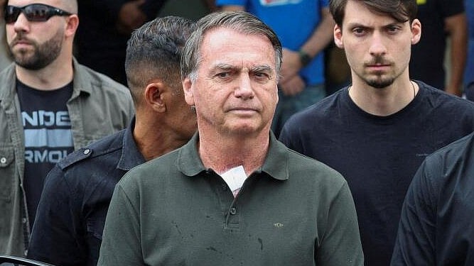 <div class="paragraphs"><p>Former Brazilian President Jair Bolsonaro leaves the hospital where he went to undergo a skin surgery procedure, authorized by Supreme Court Justice Alexandre de Moraes, leaving the house arrest after being convicted by a Supreme Court majority of plotting a coup to remain in power after losing the 2022 election, in Brasilia, Brazil.</p></div>
