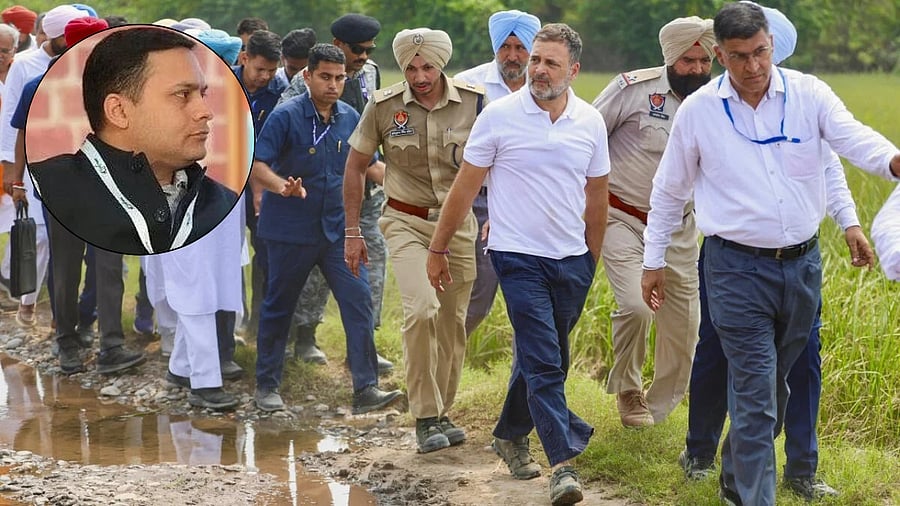 <div class="paragraphs"><p>BJP's Amit Malviya(L),&nbsp;Rahul Gandhi inspects the areas affected by recent floods, in Gurdaspur, Punjab</p></div>
