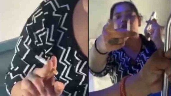 <div class="paragraphs"><p>Screengrab from the viral video showing a female passenger smoking inside the AC coach of a train.</p></div>