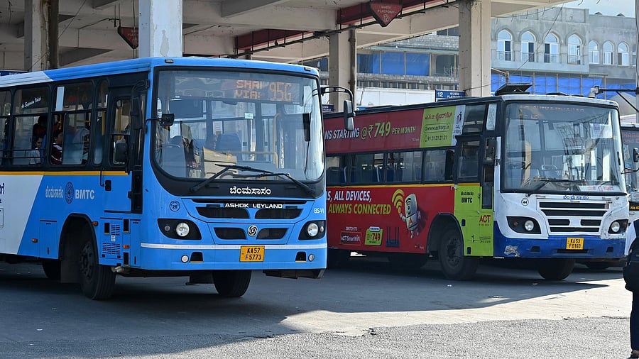 <div class="paragraphs"><p>BMTC Buses at a stand.</p></div>