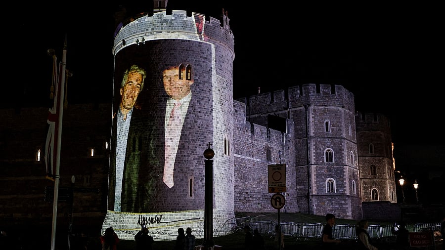 <div class="paragraphs"><p>Image of US President Donald Trump alongside disgraced financier Jeffrey Epstein is projected on Windsor castle</p><p></p></div>