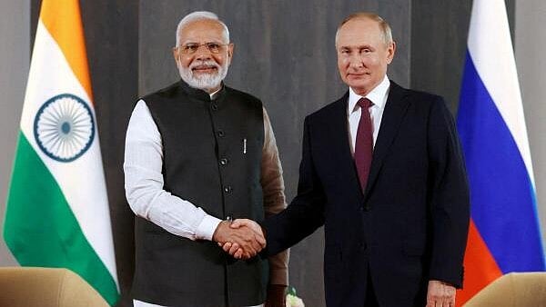 <div class="paragraphs"><p> Russian President Vladimir Putin and Prime Minister Narendra Modi (L).</p></div>