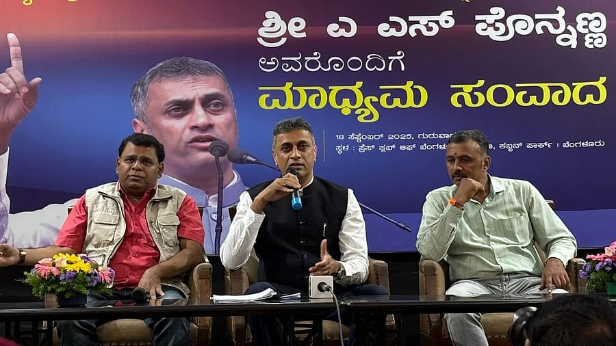 MLA and CM's legal adviser Ponnanna (centre) during a media interaction at the Press Club of Bengaluru on Thursday.