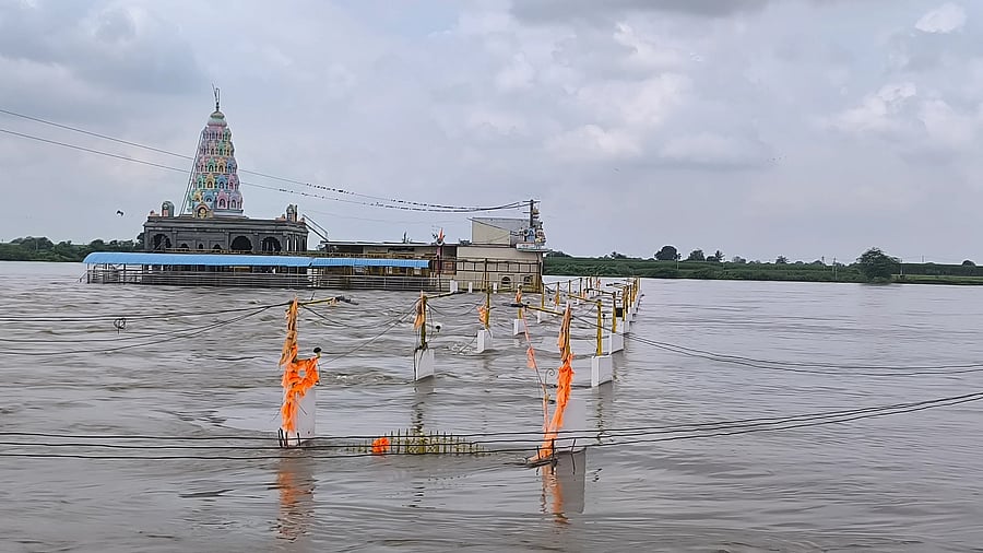 The overflowing Bhima river submerges Yellammadevi temple at Mannur in Afzalpur taluk, Kalaburagi district. As much as 1.5 lakh cusec of water is being added to Bhima river from three Maharashtra dams.