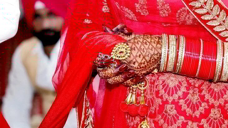 <div class="paragraphs"><p>Representative image of a couple during Anand Karaj, the traditional Sikh wedding ritual.</p></div>
