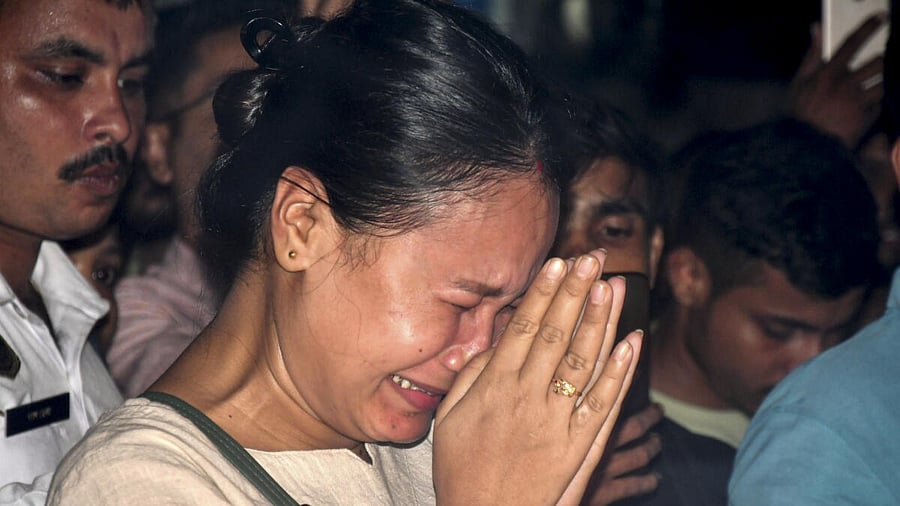 <div class="paragraphs"><p>A fan gets emotional after singer Zubeen Garg died while scuba diving in Singapore, outside his residence in Guwahati, Friday, Sept. 19, 2025.</p></div>