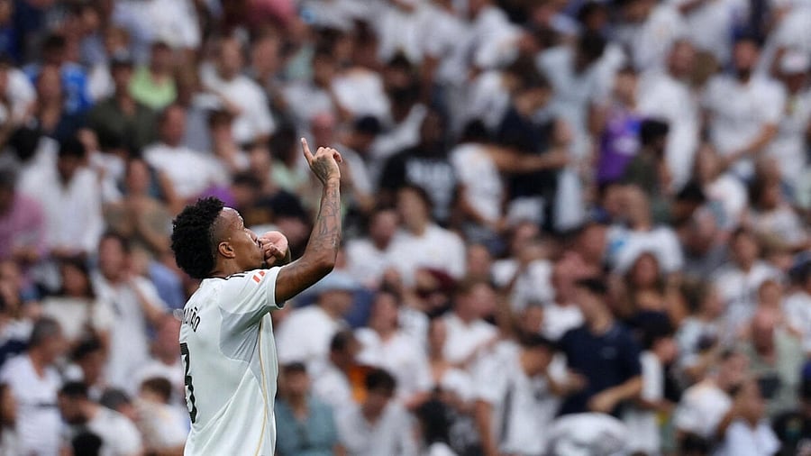 <div class="paragraphs"><p>Real Madrid's Eder Militao celebrates scoring their first goal.</p></div>