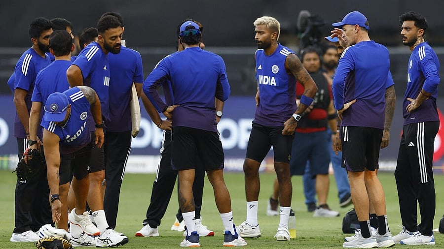 <div class="paragraphs"><p>India's Hardik Pandya with teammates during the warm up before the match.</p></div>