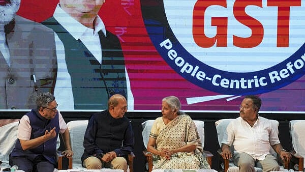 <div class="paragraphs"><p>Union Minister of Finance and Corporate Affairs Nirmala Sitharaman with West Bengal BJP President Samik Bhattacharya, extreme right, and others during a discussion on 'Next Gen GST' reforms, in Kolkata</p></div>