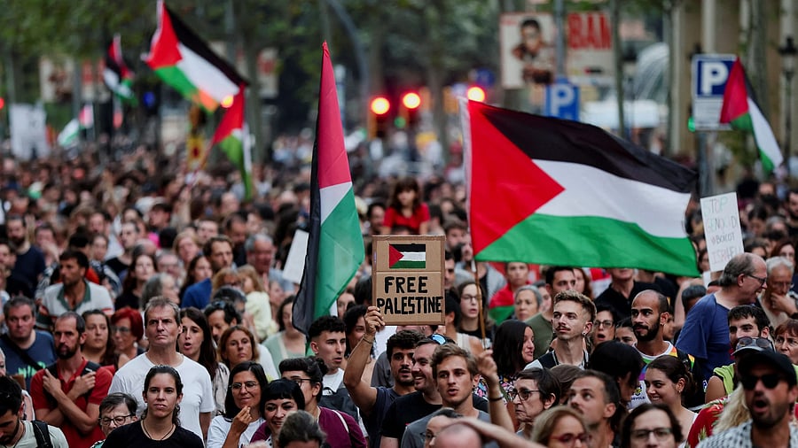 <div class="paragraphs"><p>A demonstrator holds up a sign reading "Free Palestine" during a protest in support of Palestinians, in Barcelona, Spain on September 18.&nbsp;</p></div>