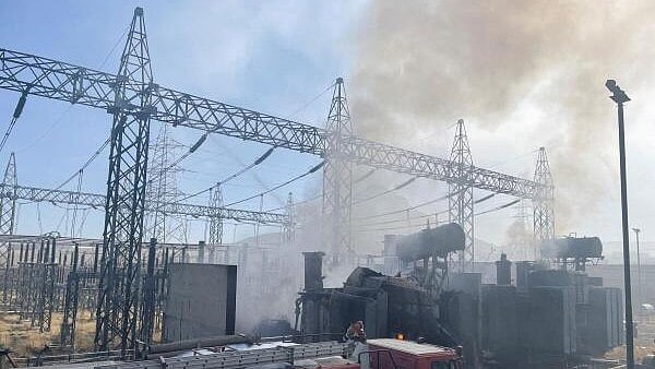 <div class="paragraphs"><p>Smoke billows after an airstrike.</p></div>