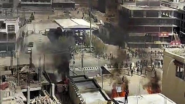 <div class="paragraphs"><p>Smoke billows out from a structure set ablaze by miscreants amid a massive protest and shutdown, in Leh, Ladakh.</p></div>