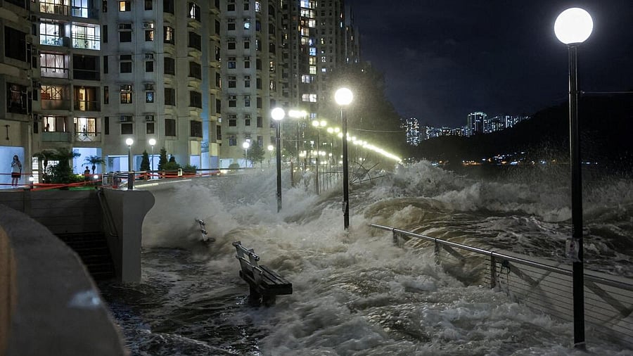<div class="paragraphs"><p>Waves from Super Typhoon Ragasa crash onto chairs by the shore in Hong Kong, China.</p></div>