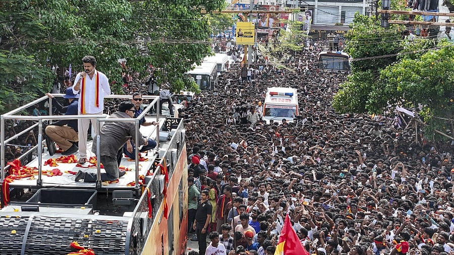 <div class="paragraphs"><p>Tamilaga Vettri Kazhagam (TVK) chief and actor Vijay greets supporters during a rally, in Tiruchirapalli district, Tamil Nadu.</p></div>