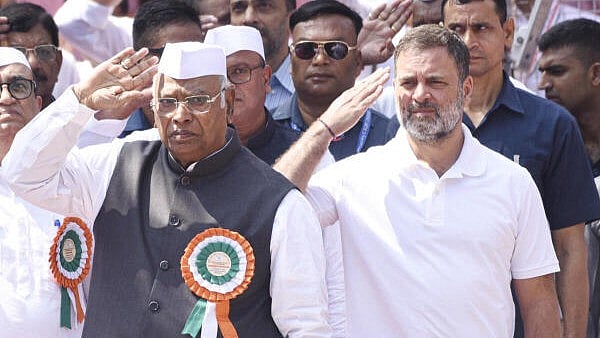 <div class="paragraphs"><p>Congress President Mallikarjun Kharge with party leader and LoP in the Lok Sabha Rahul Gandhi during the party's flag hoisting ceremony before the extended Congress Working Committee (CWC) meeting, in Patna.</p></div>