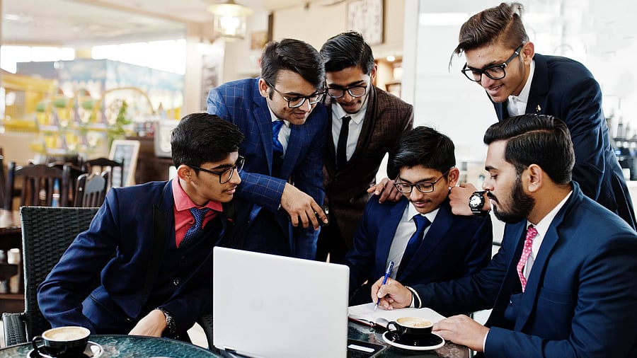 <div class="paragraphs"><p>A representative image of students discussing in a group.</p></div>