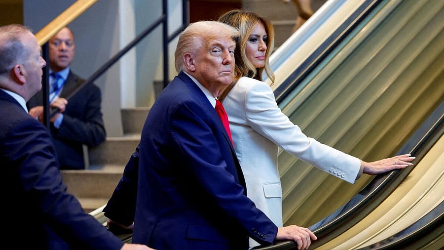 <div class="paragraphs"><p>US President Donald Trump and first lady Melania Trump ride an escalator as they arrive to attend the 80th United Nations General Assembly, in New York City, New York, U.S., September 23, 2025.</p></div>