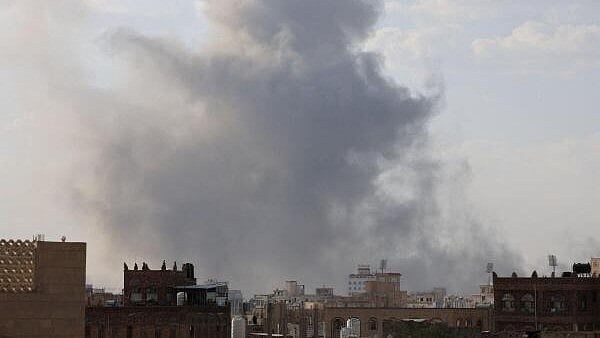 <div class="paragraphs"><p>Smoke rises from the sites of Israeli airstrikes in Sanaa, Yemen.</p></div>