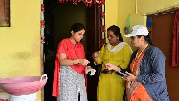 <div class="paragraphs"><p>Enumerators collect details from a citizen in Hubballi on Thursday, as part of the socio-economic survey.</p></div>