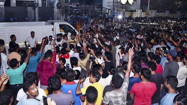<div class="paragraphs"><p>People throng outside the residence of Siddhartha Sharma, manager of music icon late Zubeen Garg.</p></div>
