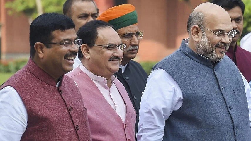 <div class="paragraphs"><p>BJP's JP Nadda with Dharmendra Pradhan and Amit Shah.</p></div>