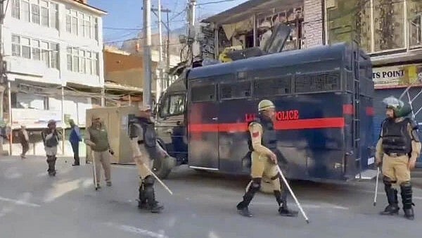 <div class="paragraphs"><p>Police personnel stand guard a day after violence erupted over statehood and other demands, in Leh, Ladakh. </p></div>