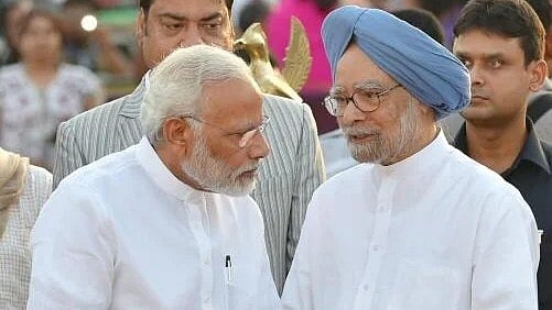 <div class="paragraphs"><p>File Photo shows Former PM Manmohan Singh with PM Narendra Modi.</p></div>