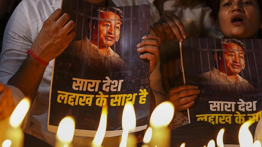 <div class="paragraphs"><p>Agitators hold posters during a protest by AAP over the arrest of climate activist Sonam Wangchuk, at Jantar Mantar, in New Delhi, Friday, Sept. 26, 2025.</p></div>