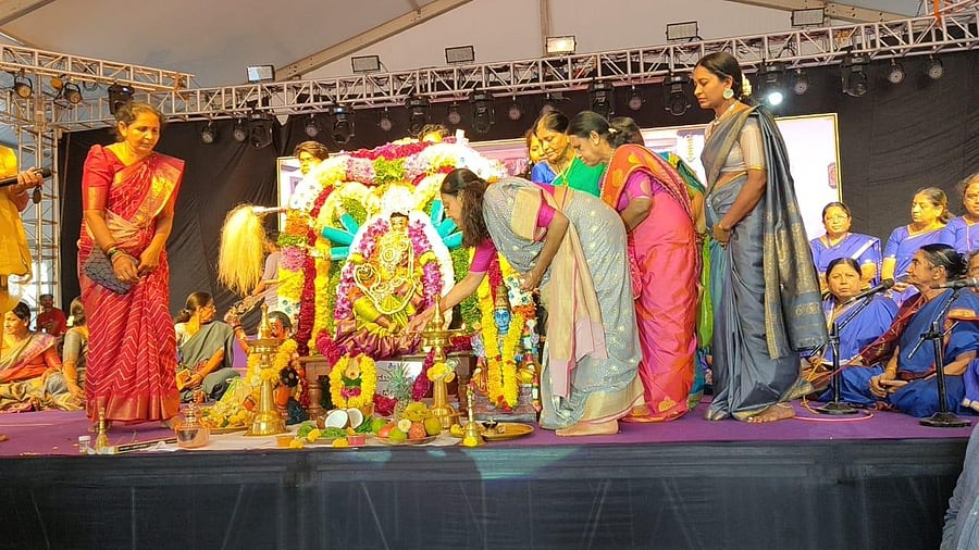 Women offer puja to Chamundeshwari during the Dasara festival in Sahakaranagar on Saturday.