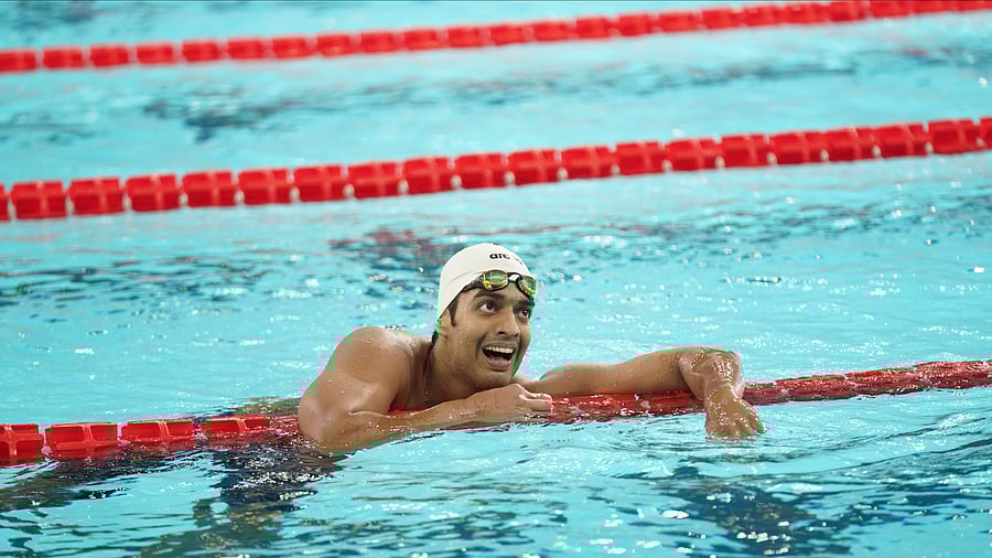 <div class="paragraphs"><p>Srihari Natraj celebrates after winning one of the two silvers on the opening day of the Asian Aquatics Championships in Ahmedabad on Sunday. </p></div>