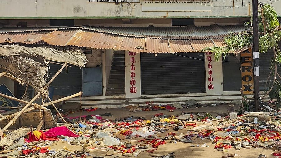 <div class="paragraphs"><p>Footwear and other belongings of people, who attended the rally of actor and Tamilaga Vetri Kazhagam (TVK) chief Vijay, lie on a road in the aftermath of a stampede during the rally, in Karur district, Tamil Nadu, Sunday, Sept. 28, 2025.</p></div>
