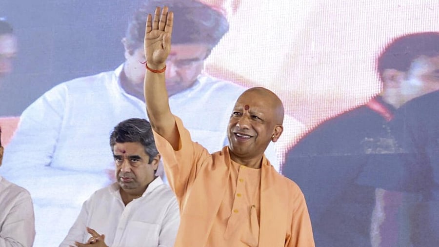<div class="paragraphs"><p>Uttar Pradesh Chief Minister Yogi Adityanath waves to the gathering during the foundation stone laying and inauguration ceremony of various public welfare projects, in Balrampur district.</p></div>