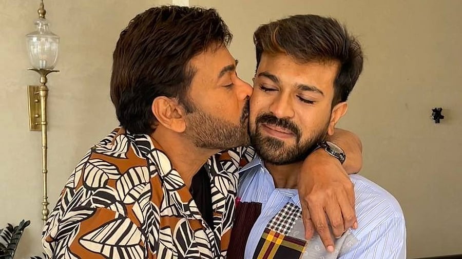 <div class="paragraphs"><p> Superstar Chiranjeevi (L) and his son and actor Ram Charan</p></div>
