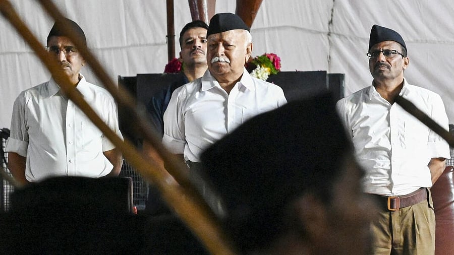 <div class="paragraphs"><p>Rashtriya Swayamsevak Sangh (RSS) chief Mohan Bhagwat looks on as volunteers take part in a 'Path Sanchalan' (route march) to mark the centenary year of RSS, in Nagpur. </p></div>