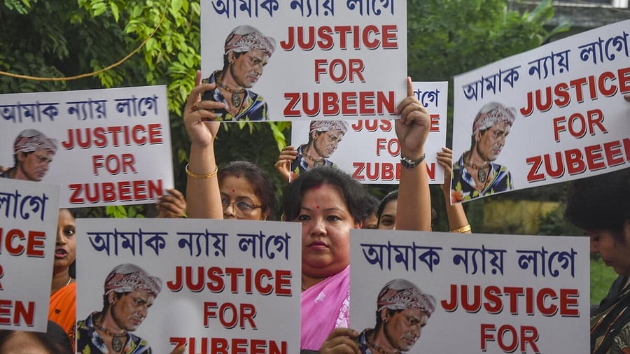 <div class="paragraphs"><p>People stage a protest demanding justice for singer Zubeen Garg after he died while scuba diving in Singapore, in Guwahati.</p></div>