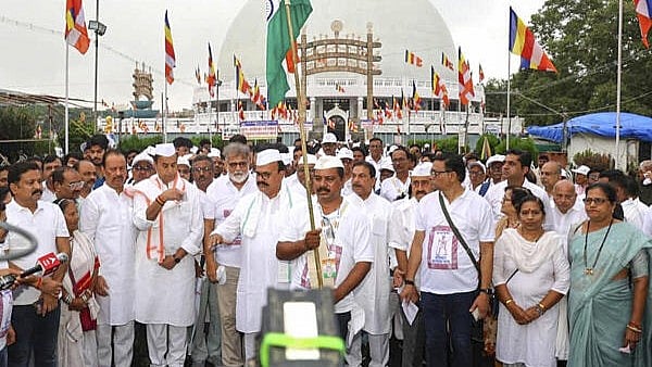 <div class="paragraphs"><p>Maharashtra Pradesh Congress Committee President Harshwardhan Sapkal with the great-grandson of Mahatma Gandhi, Tushar Gandhi and other party leaders, takes part in the ‘Samvidhan Satyagraha Padyatra’ from Deekshabhoomi.</p></div>