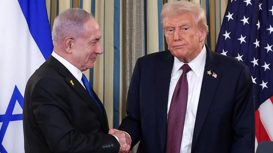 <div class="paragraphs"><p>US President Donald Trump and Israeli Prime Minister Benjamin Netanyahu shake hands at a joint press conference in the State Dining Room at the White House in Washington, DC, US.</p></div>