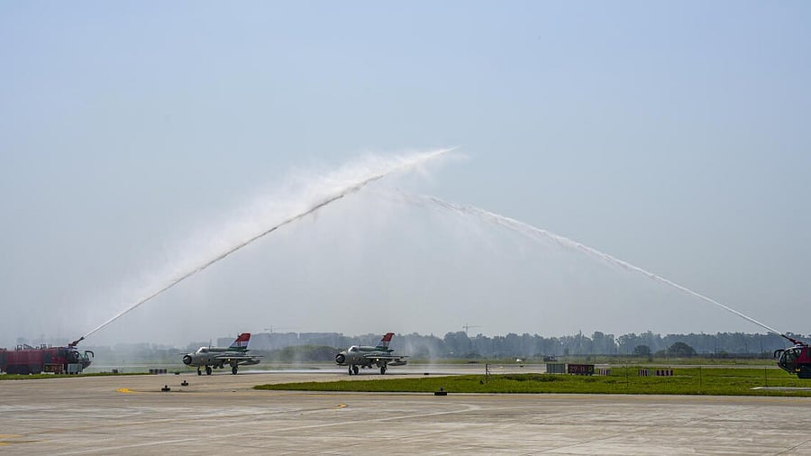<div class="paragraphs"><p>Indian Air Force MiG-21 aircraft receive water salute during the ‘MiG-21 Operational Flying Culmination Ceremony’ </p></div>