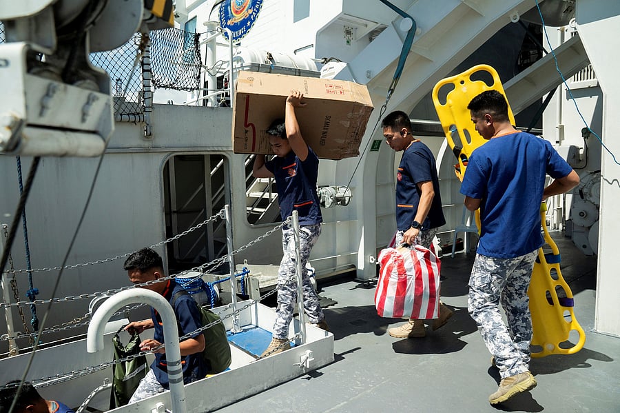 <div class="paragraphs"><p>Members of the Philippine Coast Guard (PCG) along with medical personnel prepare medical supplies on board of the BRP Teresa Magbanua following the 6.9 magnitude earthquake in Cebu province, at the PCG Headquarters in Manila, Philippines, October 1, 2025.</p></div>