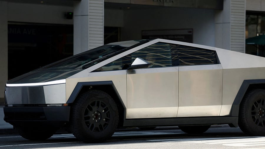 <div class="paragraphs"><p>A Tesla Cybertruck is driven down Pennsylvania Ave near the White House in Washington, US.</p></div>