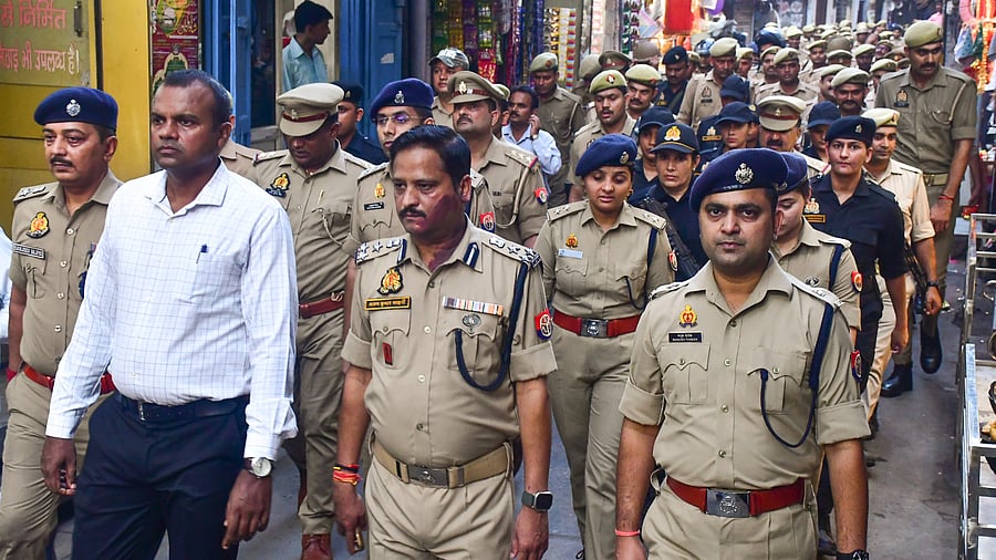 <div class="paragraphs"><p>SP City Manush Pareek, front right, and other police personnel during a flag march on the eve of the ‘Dussehra’ festival, in Bareilly, Uttar Pradesh, Wednesday, Oct. 1, 2025. </p></div>