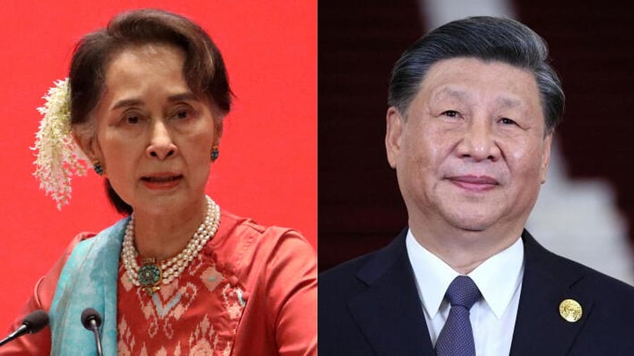 <div class="paragraphs"><p>Aung San Suu Kyi (L) and Chinese President Xi Jinping.</p></div>
