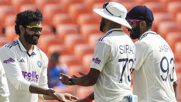 <div class="paragraphs"><p>India's Ravindra Jadeja celebrates with teammates after taking the wicket of West Indies' John Campbell.</p></div>
