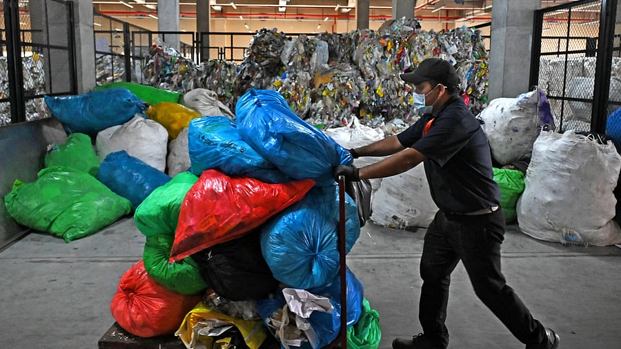 <div class="paragraphs"><p>Ghost recycling plants, fake certificates and poor auditing weaken the EPR system in India. In pic, staff of a solid waste management facility at work in Electronics City Industrial Township Authority in Bengaluru.&nbsp;</p></div>