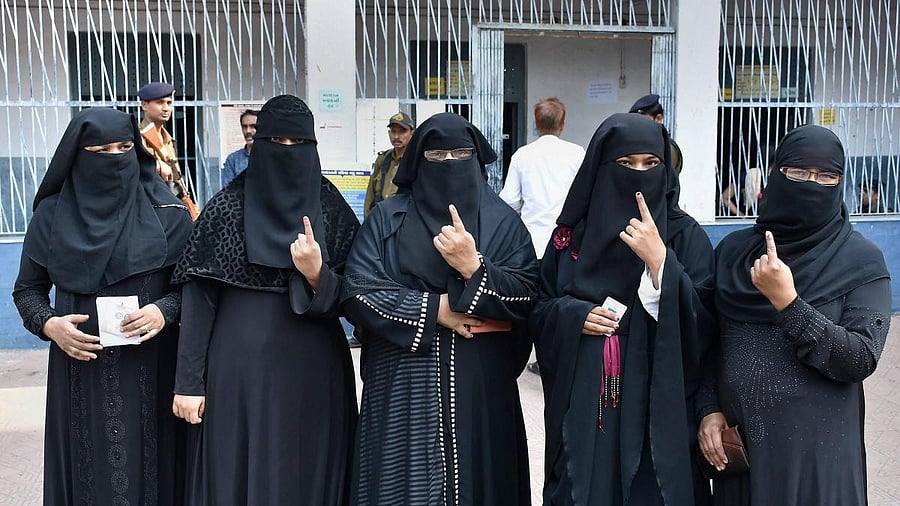 <div class="paragraphs"><p>Bihar Assembly Elections 2025: BJP urges EC to verify identity of burqa-clad voters, RJD calls it political ploy</p></div>